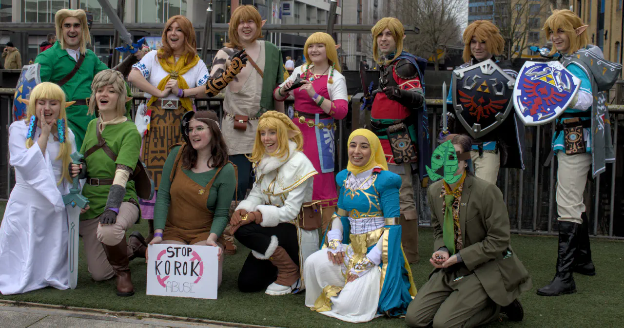 A group of cosplays arrayed outside all in various cosplays from the Legend of Zelda series.